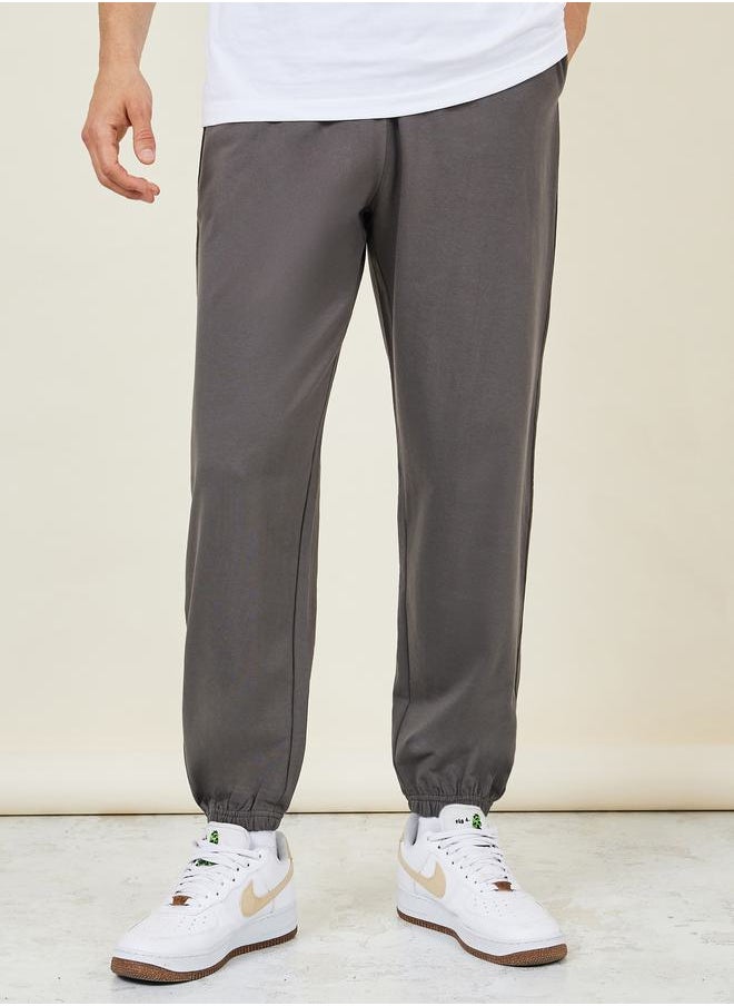 Solid French Terry Relaxed Fit Joggers - pzsku/Z19BB0DD47F6C36F0A28EZ/45/_/1712414862/2d8072a9-50f1-4ee1-8a1b-430b3a7b2d86