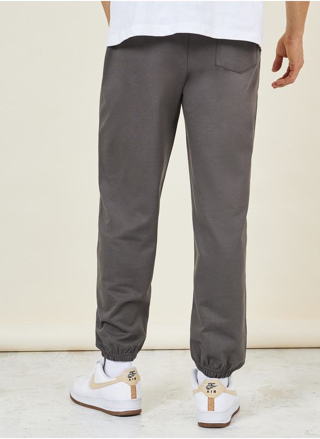 Solid French Terry Relaxed Fit Joggers - pzsku/Z19BB0DD47F6C36F0A28EZ/45/_/1712414866/3e69940a-2e43-4c9e-9acc-edccd2d62d89