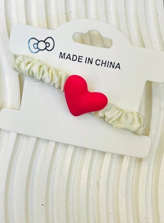 Hair elastic for kids with an elegant heart design in the center — A delicate touch for your little one's beauty!