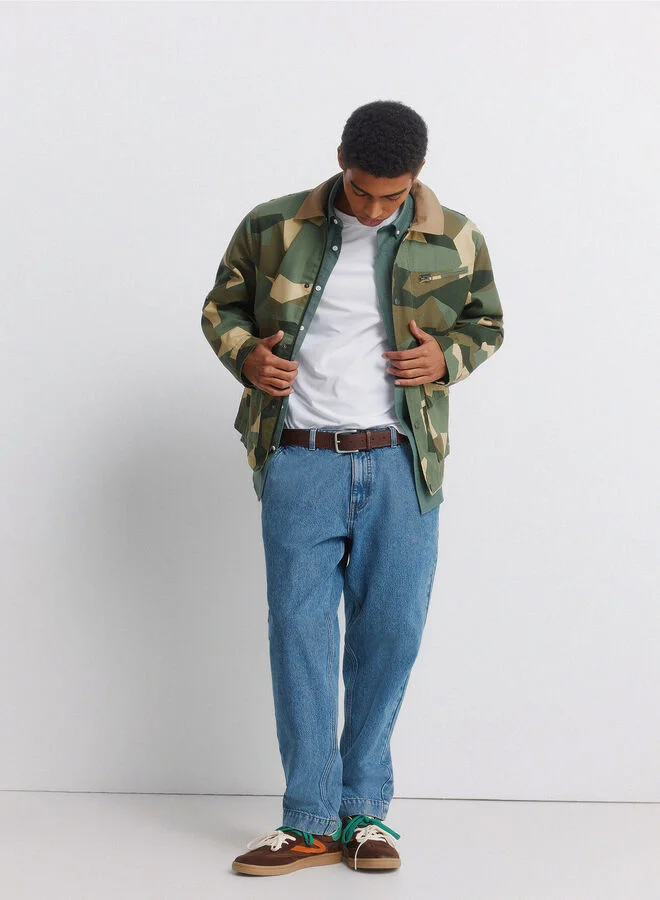 Springfield  Camouflage print cotton and polyester blend ripstop texture lightweight short parka with contrast cotton shirt collar, zip fastening and snap buttons, patch pockets with snap button, zip pocket on chest, inner pocket, adjustable cuffs, and decorative label detail. for Men | Best Price UAE