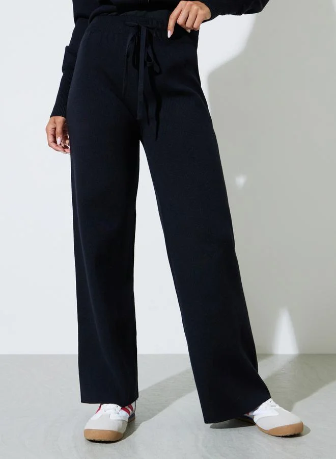 Styli  Black Knit Zip-Up Sweater and Pants Co-Ord Set for Women | Best Price UAE