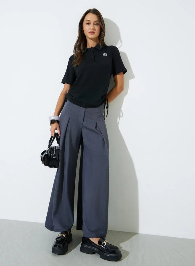 ستايلي Black Polo T-Shirt with Ruched Side Detail