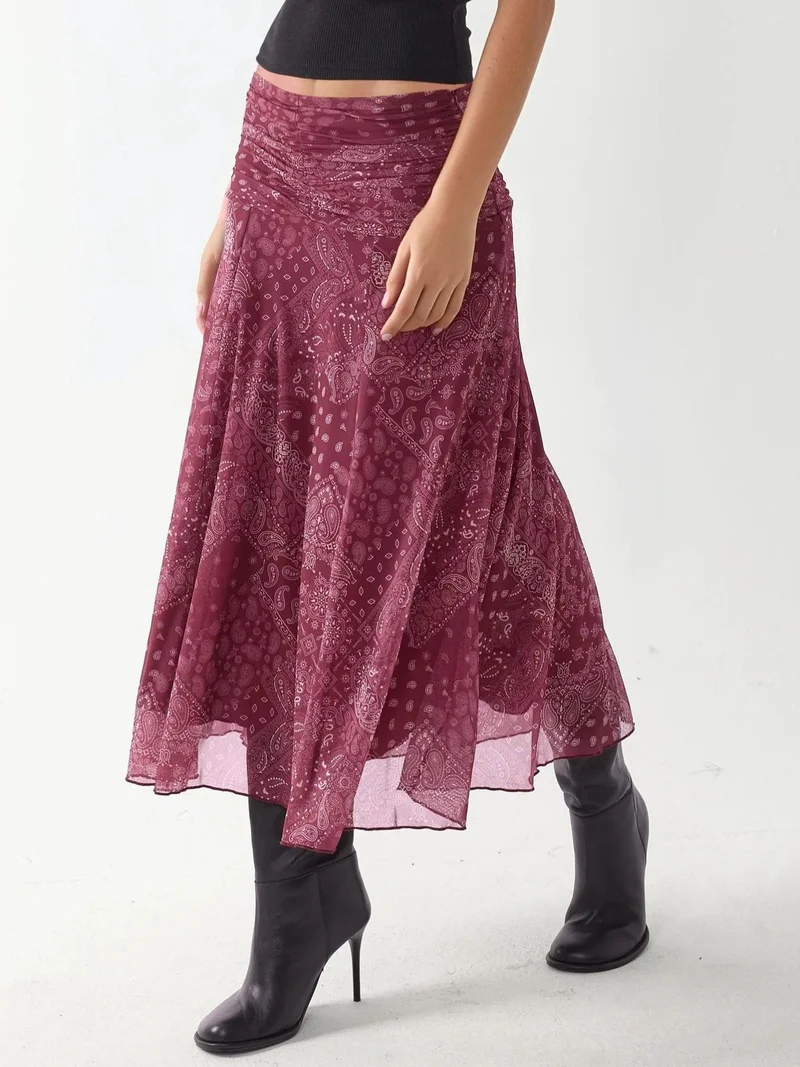 زوبعة تنورة ميدي ملفوفة بنقوش وتفاصيل بكشكش