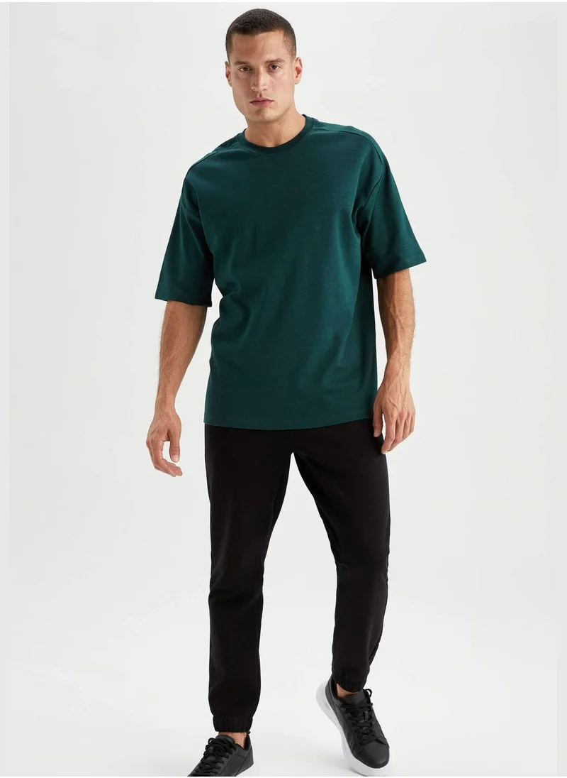 ديفاكتو Oversize Fit Short Sleeve T-Shirt