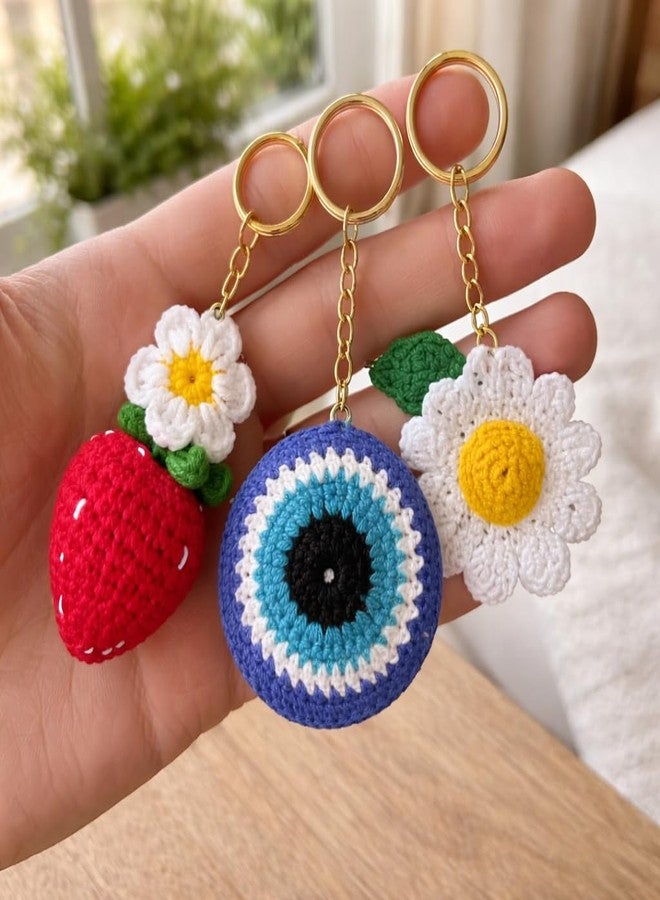 craftelio Handmade Crochet Keychain Combo Set of 3 Strawberry Daisy Evil Eye Charm with Golden Ring Bag Charm for Women Girls - Image 1
