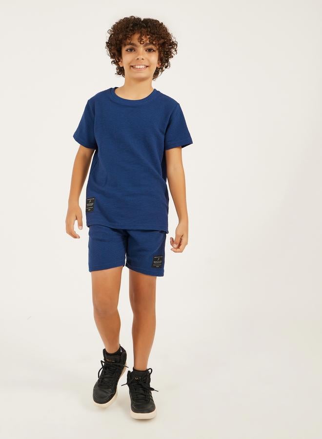 Styli Textured T-Shirt Detail and Shorts with Badge Set - Image 1