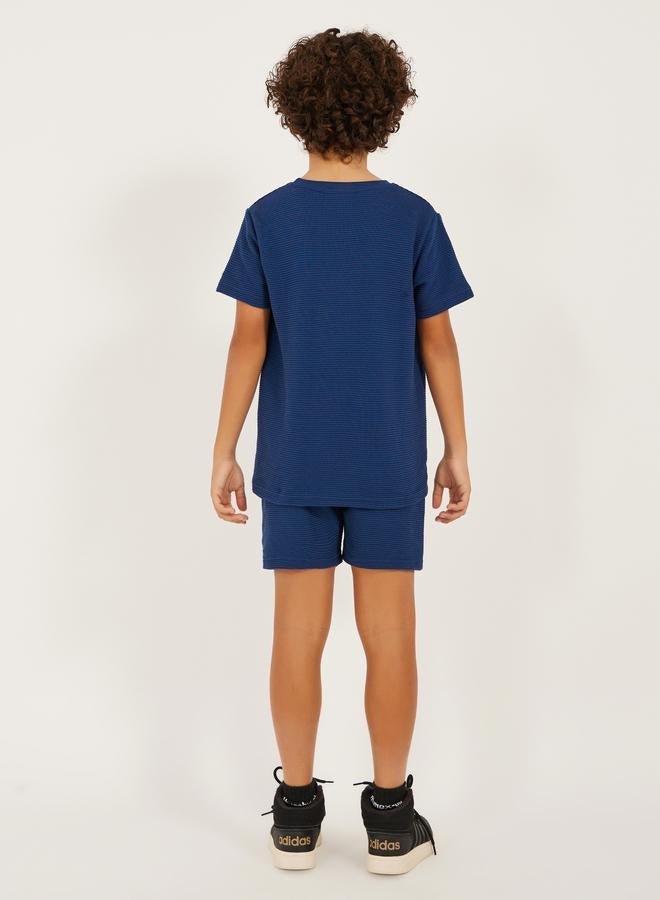 Styli Textured T-Shirt Detail and Shorts with Badge Set - Image 4