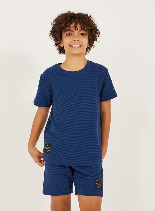 Styli Textured T-Shirt Detail and Shorts with Badge Set - Image 2