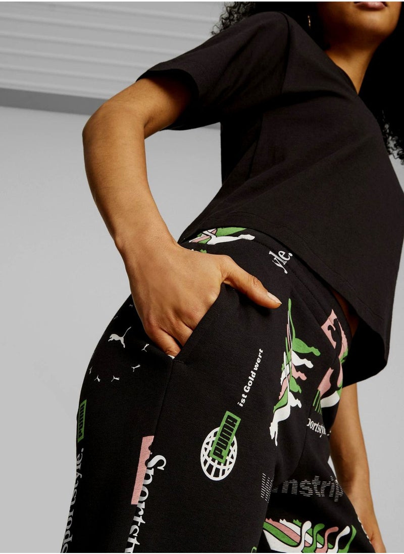 PUMA - Classics Brand Love Aop Sweatpants - Image 1