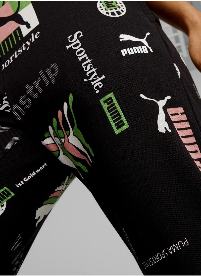 PUMA - Classics Brand Love Aop Sweatpants - Image 1