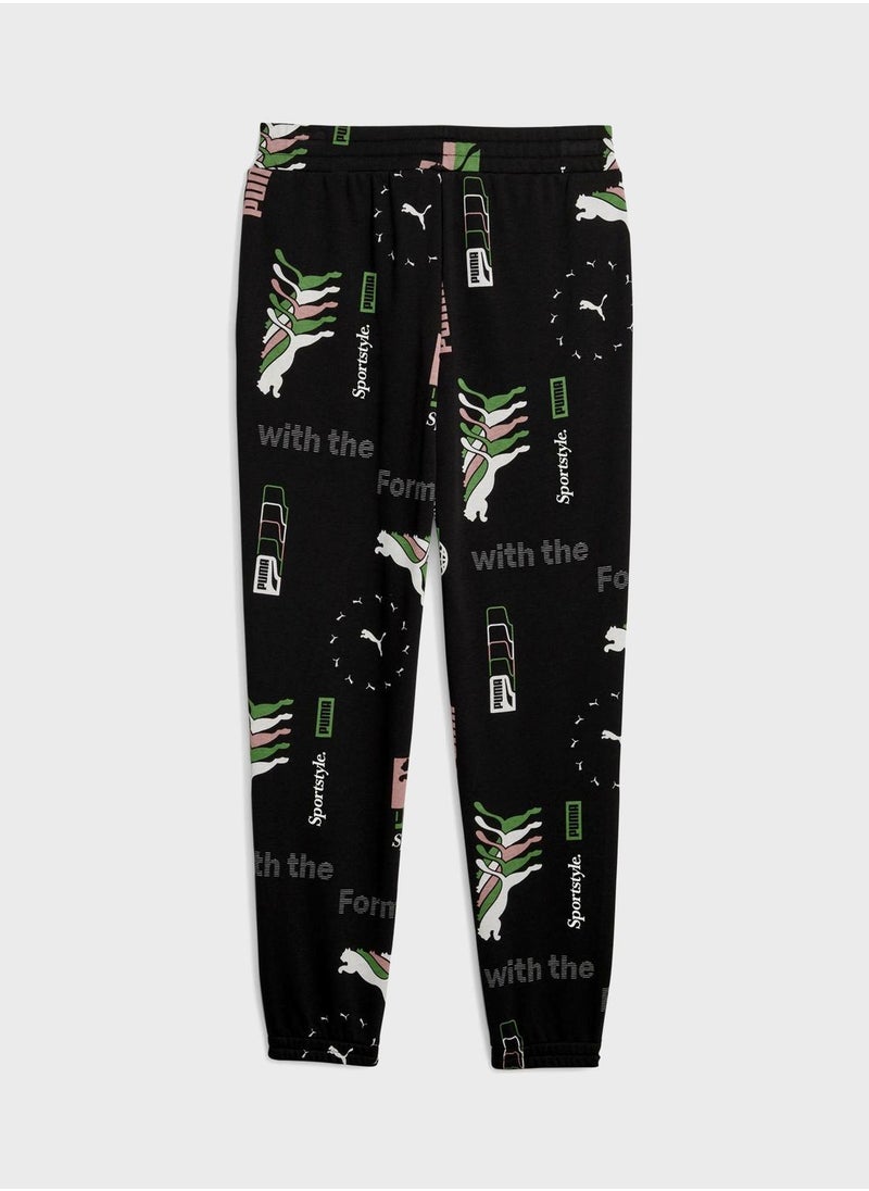 PUMA - Classics Brand Love Aop Sweatpants - Image 1