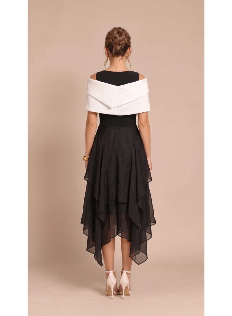 2Trendy Women's Black Midi Dress with Cold Shoulder Cutouts, Wide Shoulder Panel and Layered Skirt