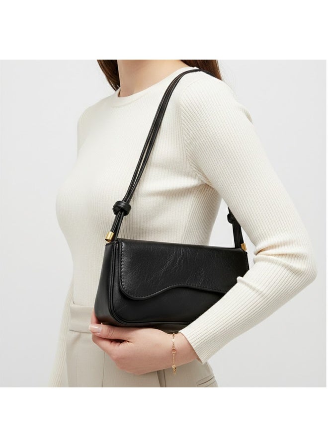 شنطة يد نسائية صغيرة جلد بلون الاسود - Image 1