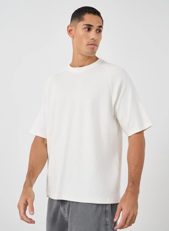 ستايلي Styli Men Solid Raglan Sleeves Oversized T-Shirt