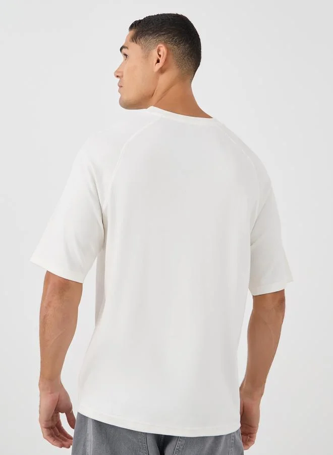 Styli Styli Men Solid Raglan Sleeves Oversized T-Shirt