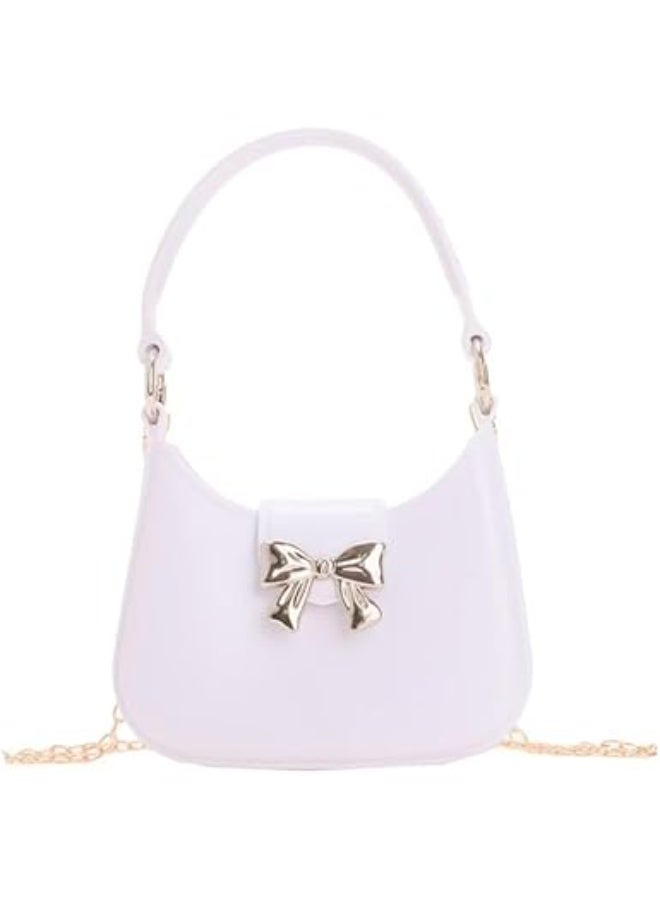 Children's plastic handbag with gold bow decoration, small top handle bag - Image 1