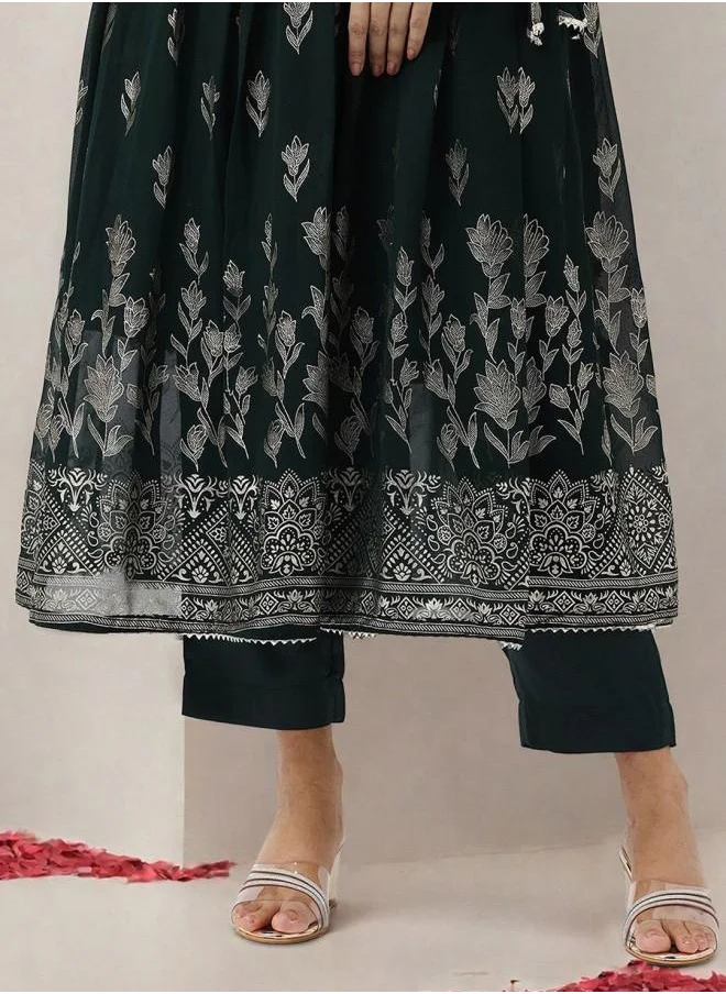 ISHIN Tunic Women Bottle Green Georgette Kurta Set with Embroidered pattern Tunic and Palazzo features a Round neckline and Three-Fourth Sleeve secured with Elastic closure and styled in Straight Fit ideal for Festive moments — a must-have for your statement wardrobe.