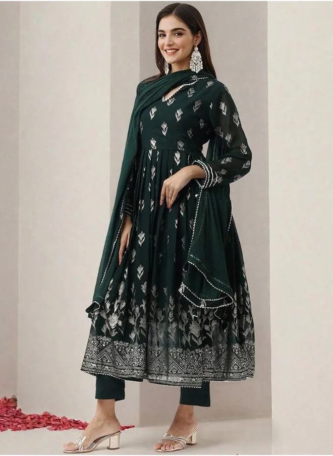 ISHIN Tunic Women Bottle Green Georgette Kurta Set with Embroidered pattern Tunic and Palazzo features a Round neckline and Three-Fourth Sleeve secured with Elastic closure and styled in Straight Fit ideal for Festive moments — a must-have for your statement wardrobe.
