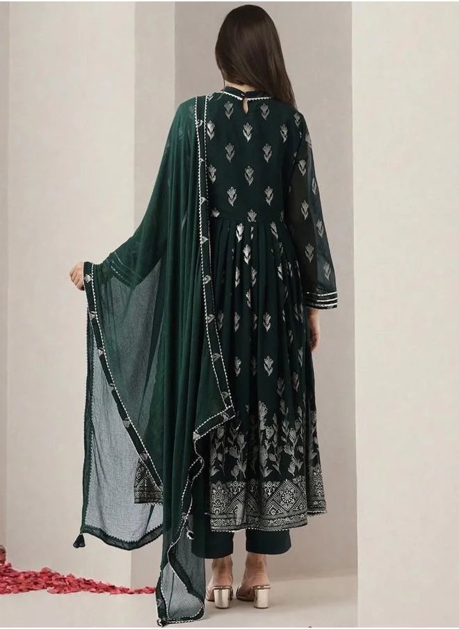 ISHIN Tunic Women Bottle Green Georgette Kurta Set with Embroidered pattern Tunic and Palazzo features a Round neckline and Three-Fourth Sleeve secured with Elastic closure and styled in Straight Fit ideal for Festive moments — a must-have for your statement wardrobe.