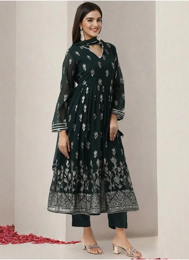 ISHIN Tunic Women Bottle Green Georgette Kurta Set with Embroidered pattern Tunic and Palazzo features a Round neckline and Three-Fourth Sleeve secured with Elastic closure and styled in Straight Fit ideal for Festive moments — a must-have for your statement wardrobe.