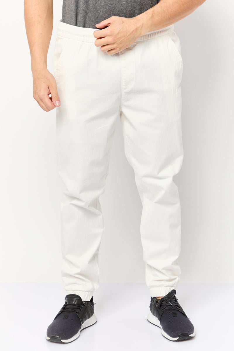 Celio Men Regular Fit Solid Jogger Pants, White - Image 1