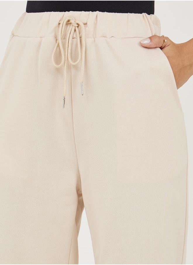 Styli - Cuffed Tapered Ankle Length Joggers with Drawstring - Image 1