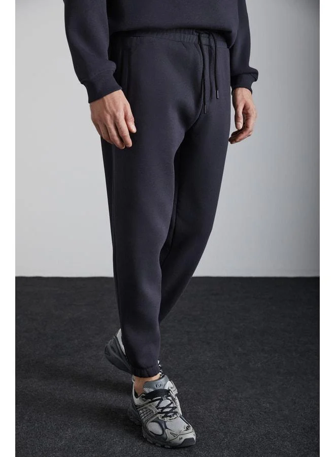 Grimelange Kyoto Men's Organic Cotton Lined Polarity Wide-Cut Elastic Jogger Anthracite Sweatpants.