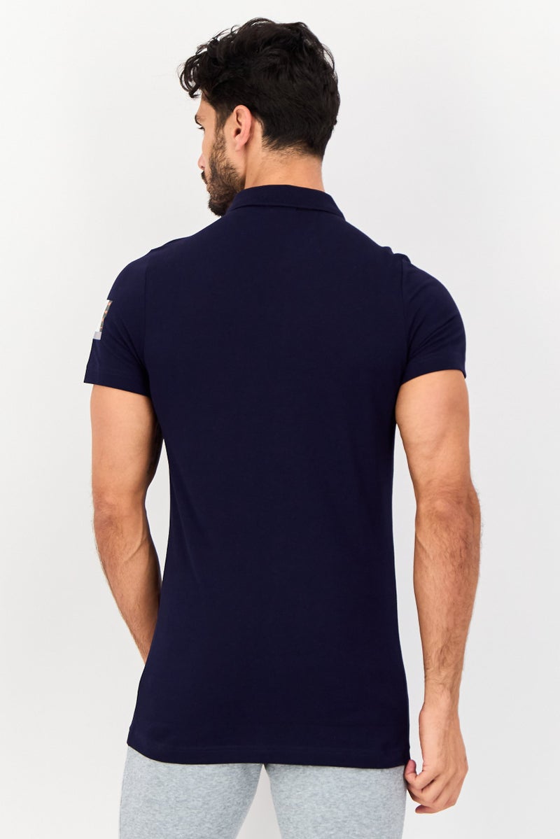 PUMA قميص بولو خارجي للرجال بقصة ضيقة بأكمام قصيرة، كحلي داكن - Image 2