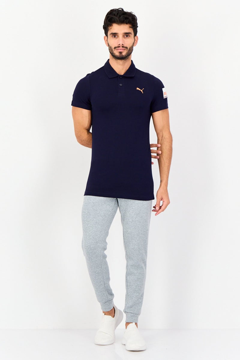 PUMA قميص بولو خارجي للرجال بقصة ضيقة بأكمام قصيرة، كحلي داكن - Image 3