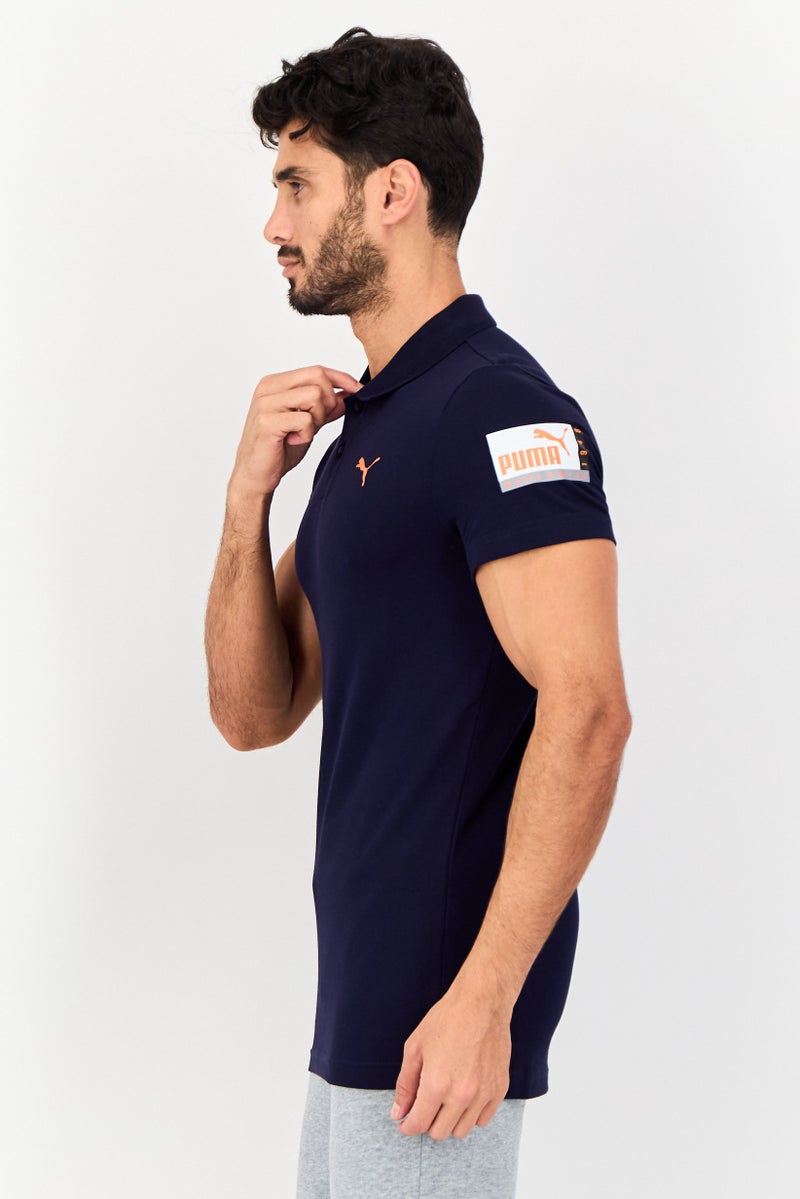 PUMA قميص بولو خارجي للرجال بقصة ضيقة بأكمام قصيرة، كحلي داكن - Image 4