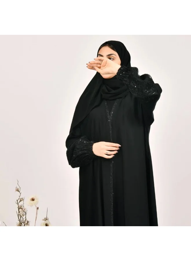عبايات لمحة عباية راقية لف سوداء بكم مزموم بقماش الدانتيل الزاهي على الاكمام واطراف العباية