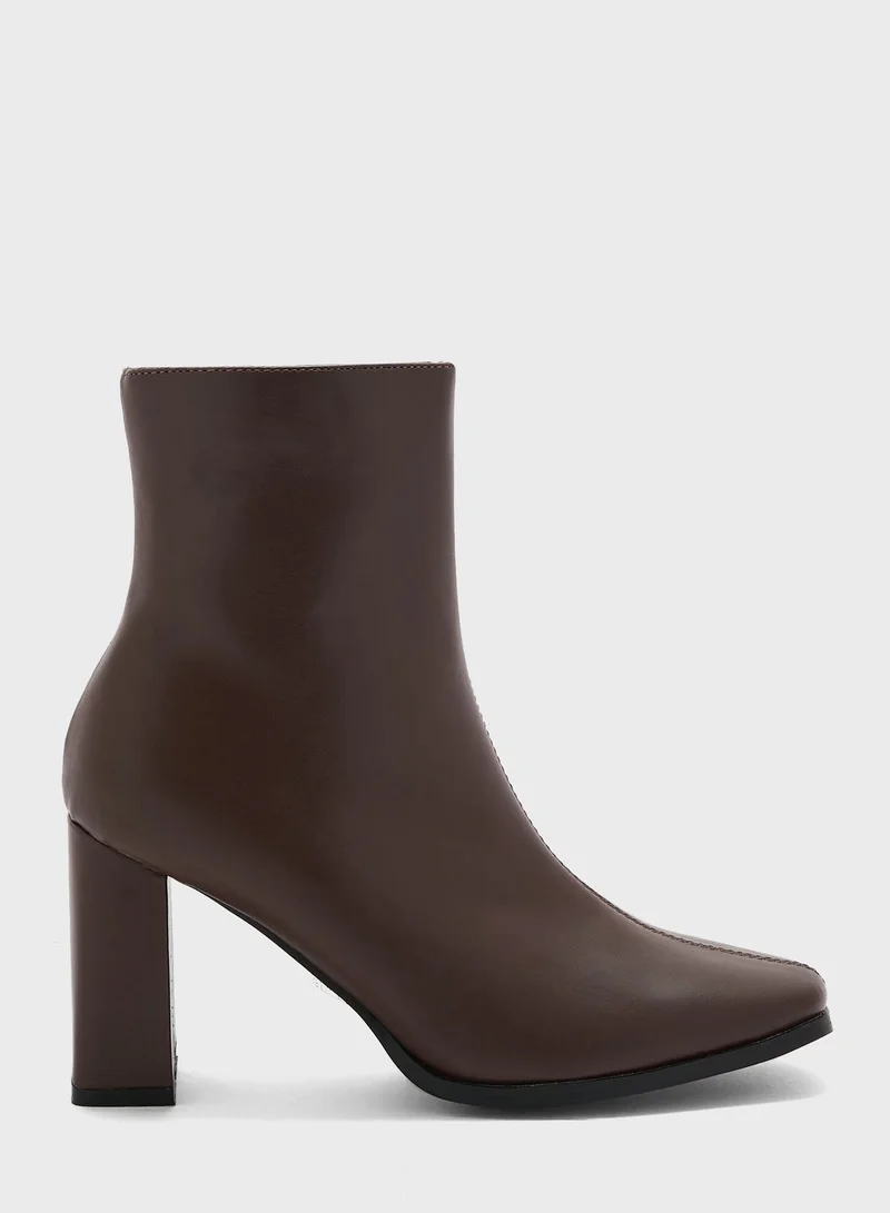 ايلا Pointed Slim Block Heel Boot