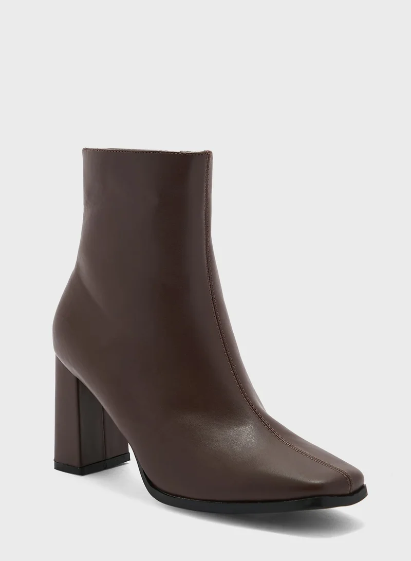 ايلا Pointed Slim Block Heel Boot