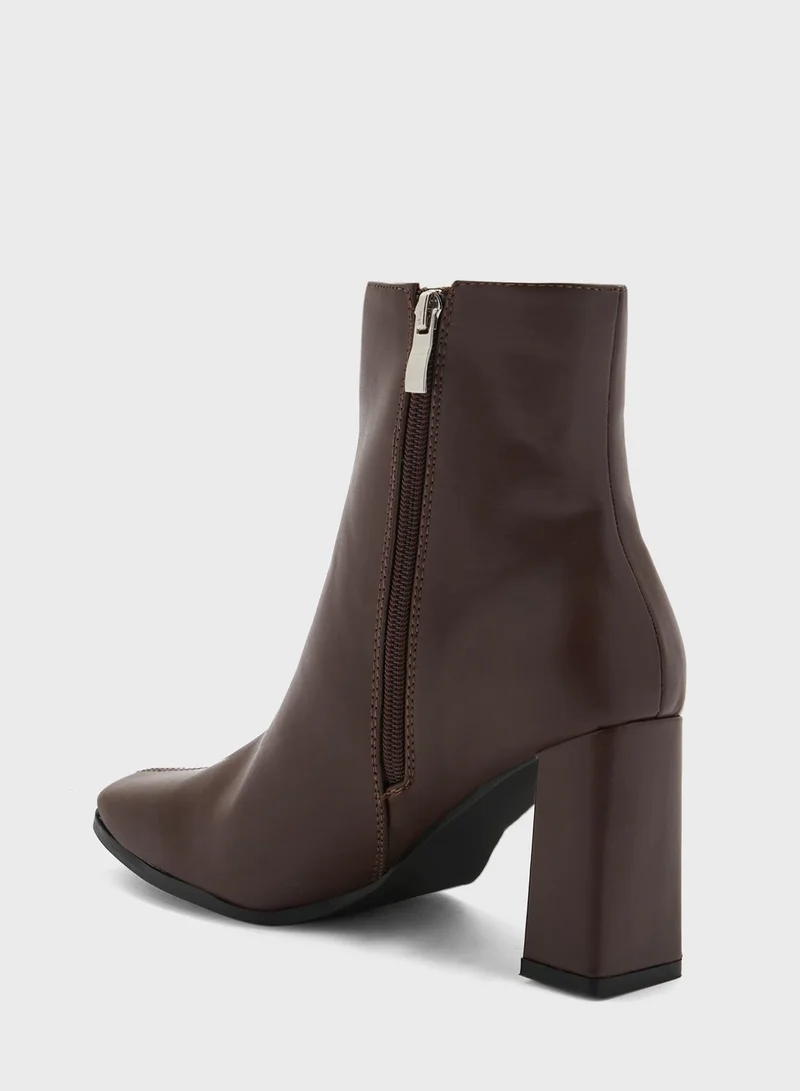 ايلا Pointed Slim Block Heel Boot