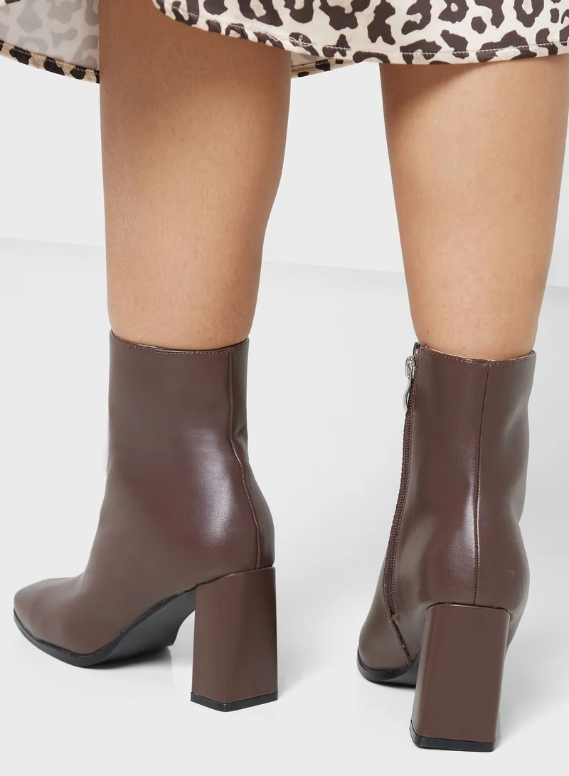 ايلا Pointed Slim Block Heel Boot