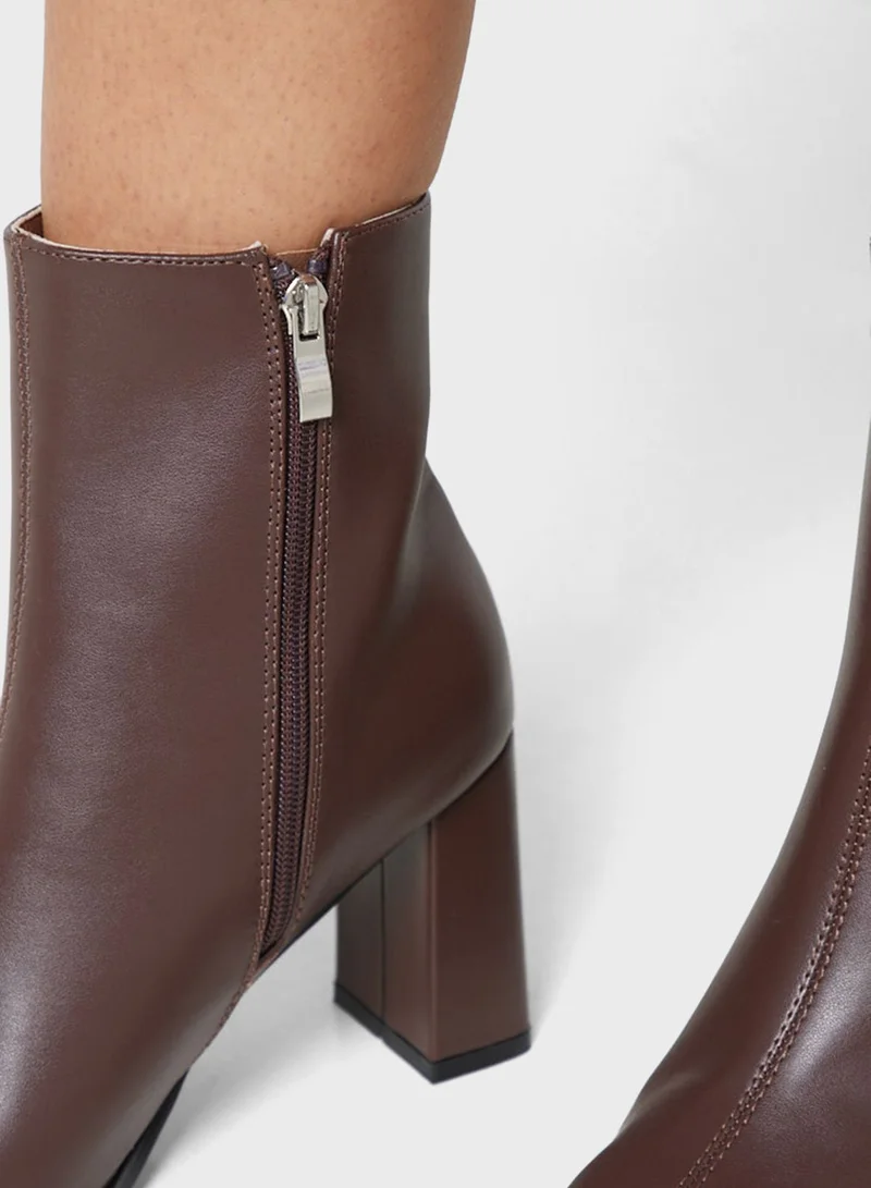 ايلا Pointed Slim Block Heel Boot