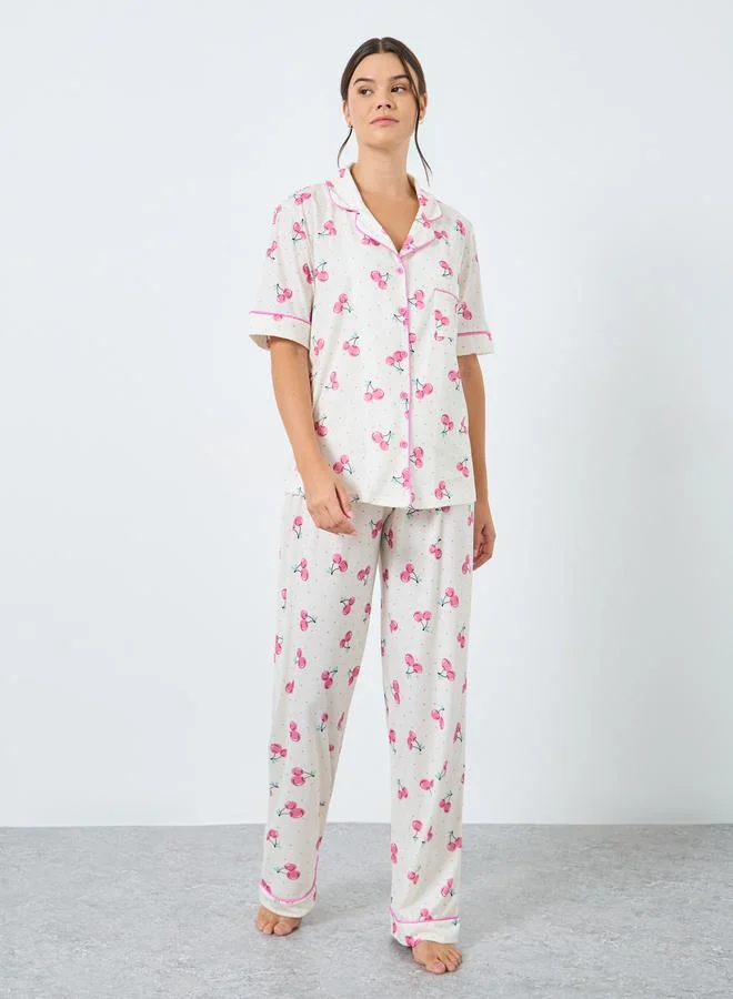 ستايلي طقم من بنطال بيجاما وبلوزة بطبعة جرافيك