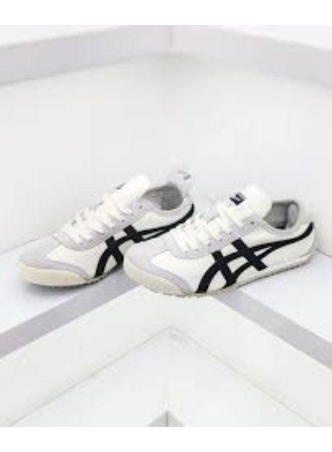 Onitsuka Tiger أونيتيكا تايجر مكسيكو 66 بيج خطوط سوداء مسطحة - Image 1