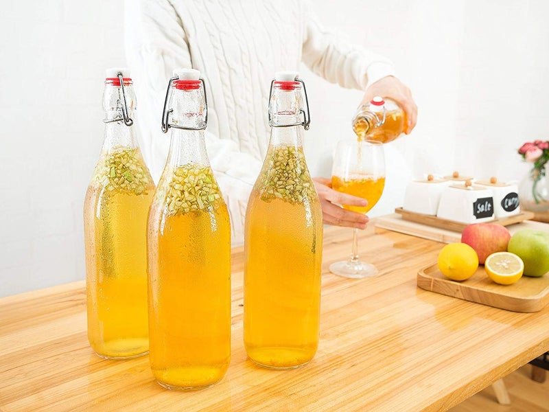 Brezzycloud Swing Top Bottles 1000ml-2 Pack Round Clear Glass Grolsch Flip Top Bottle With Stopper, for Beverages, Smoothies, Kefir, Beer, Soda, Juicing, Kombucha, Water, Milk and Vinegar - Image 1