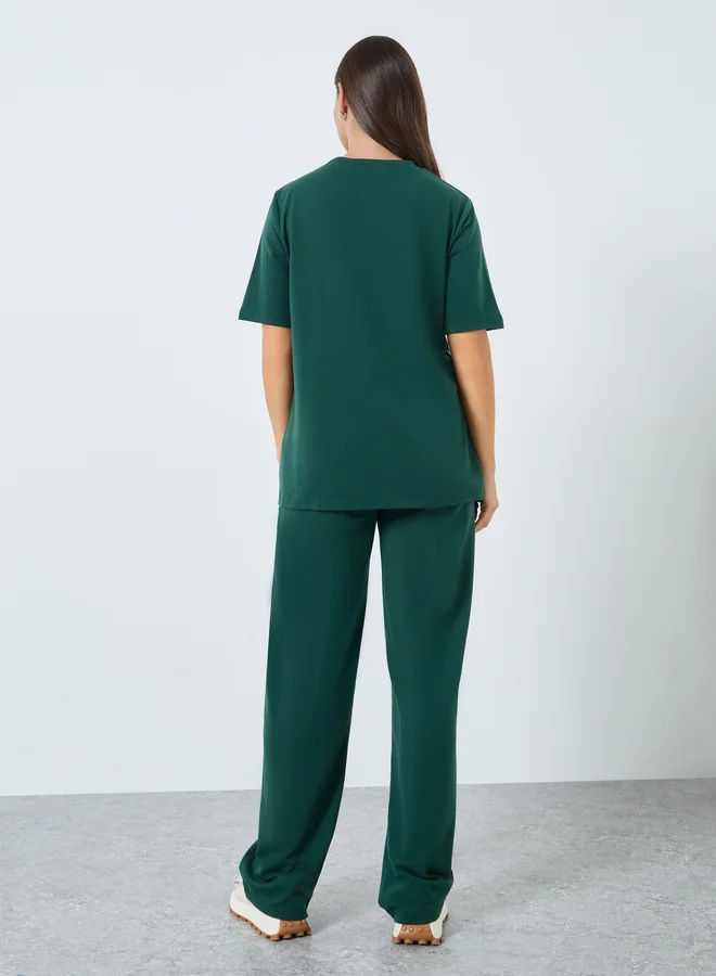 Styli Styli Dark Green Asymmetric Hem T-Shirt and Joggers Co-Ords