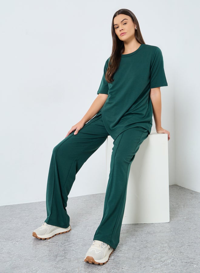ستايلي طقم تي شيرت وبنطلون جوجر بحافة غير متماثلة بلون أخضر داكن من ستايلي - Image 1