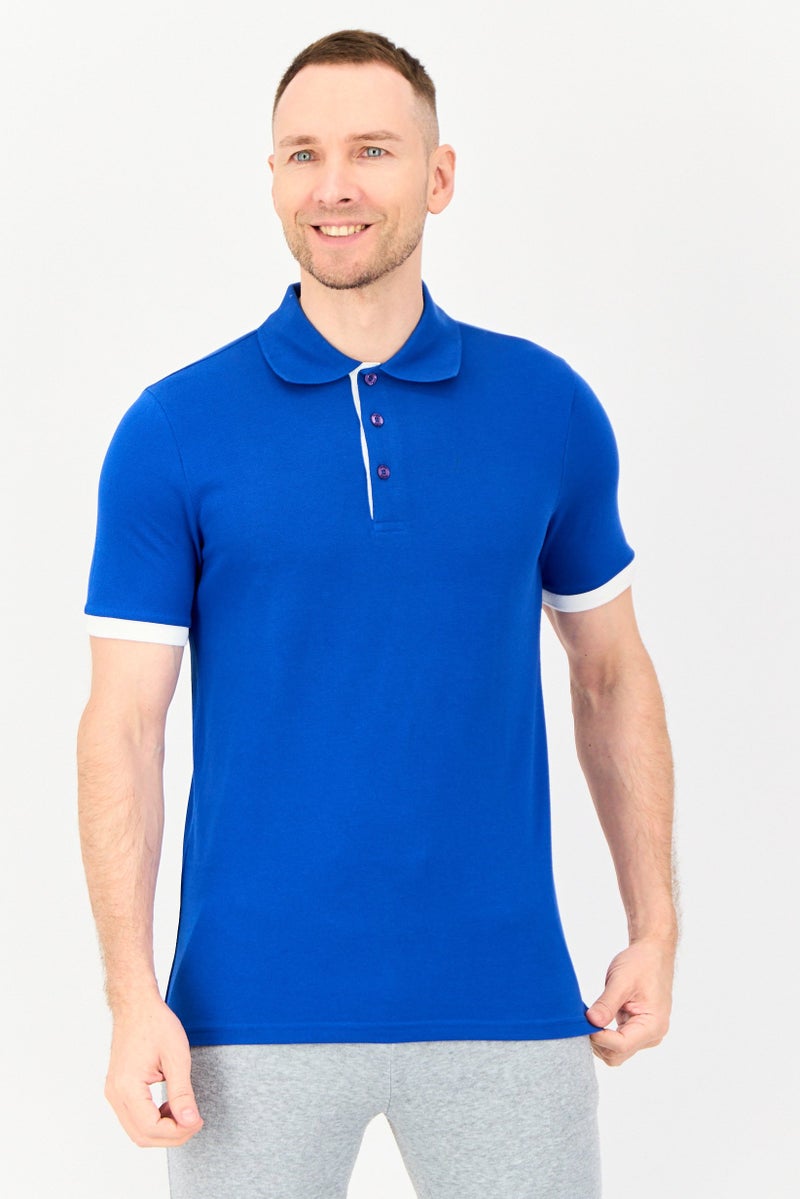 PUMA Men Sportswear Fit Short Sleeve Outdoor Polo Shirt, Royal Blue - Image 1