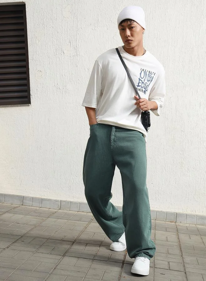 Green Baggy Jeans Washed design crafted from 100% Cotton with Button closure.