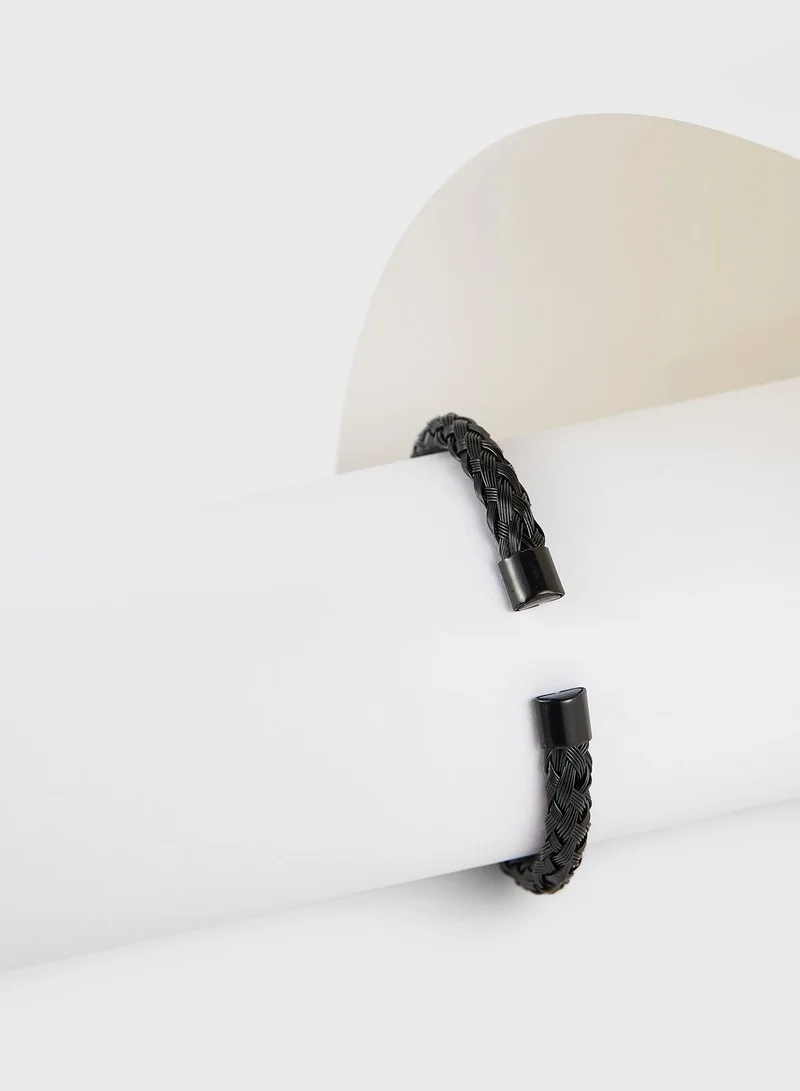 Seventy Five Metal Plait Bangle Bracelet