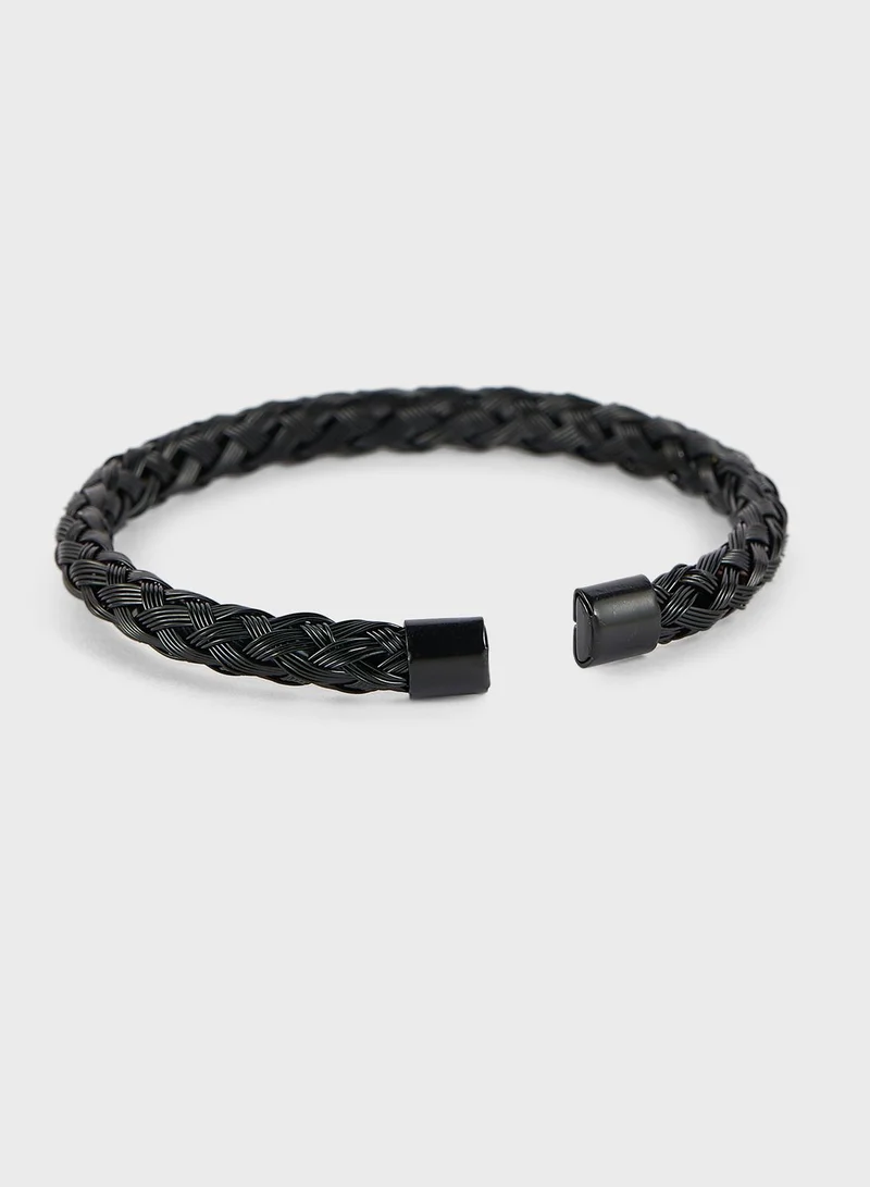 Seventy Five Metal Plait Bangle Bracelet