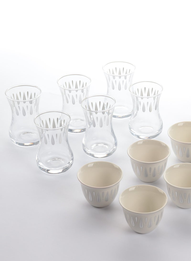 A set of glass and ceramic tea cups and coffee cups with elegant, modern designs in silver - a touch of luxury and good taste.
