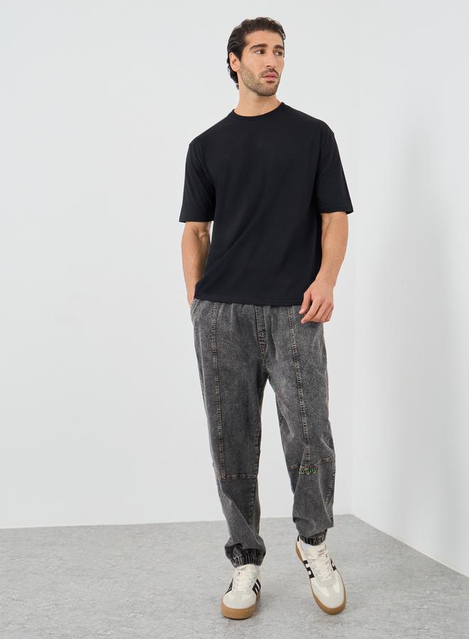 ستايلي تيشيرت أوفر سايز بياقة دائرية وطبعة شعار ستايلي - Image 3