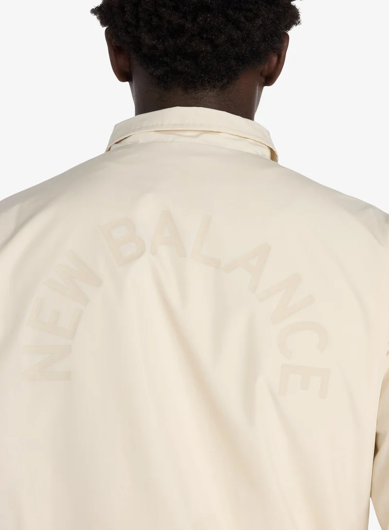 New Balance  Essential Logo Coaches Jacket for Men | Best Price UAE