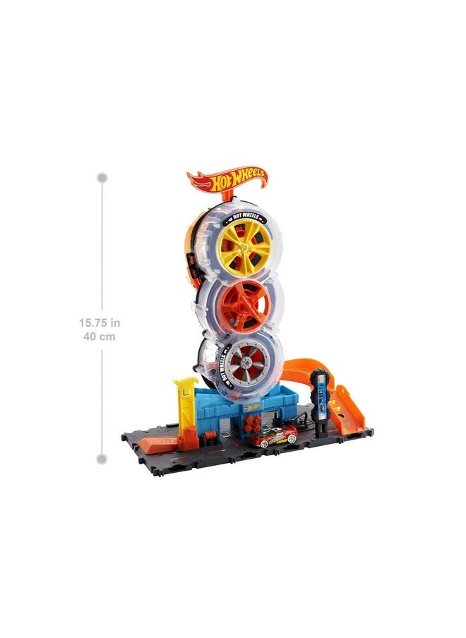 Hot Wheels - Toy Car Track Set City Super Twist Tire Shop With 1:64 Scale Car, Single Or Multi-Car Play - Image 1