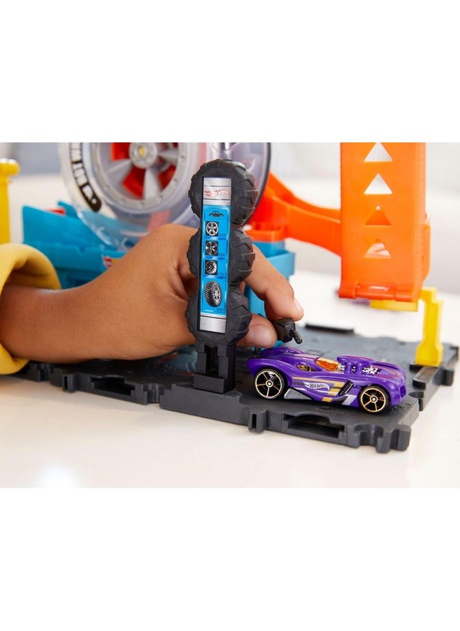 Hot Wheels - Toy Car Track Set City Super Twist Tire Shop With 1:64 Scale Car, Single Or Multi-Car Play - Image 1